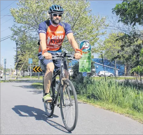  ?? SARA ERICSSON ?? Ian Lemmon sold his car nearly two years ago and rides a bicycle everywhere. Whether heading to work or picking up groceries, he bikes to get to where he needs to go.