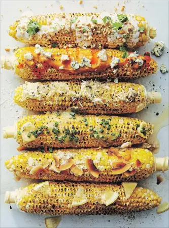  ?? RYAN LIEBE NYT ?? Ears of grilled corn on the cob, topped in six glorious ways.