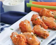  ??  ?? Crispy Baked Buffalo Chicken Wings