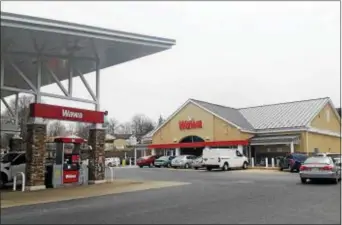  ?? DONNA ROVINS — DIGITAL FIRST MEDIA ?? Wawa has just kicked off a seasonal hiring campaign with the goal of hiring 5,000 new employees in the next three months. All of the company’s 790 stores across six states will be hiring. This photo shows the Wawa on Route 724 in North Coventry.
