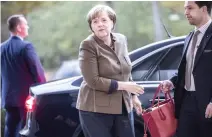  ??  ?? German Chancellor and chair of the German Christian Democratic Union (CDU) Angela Merkel arrives for coalition talks in Berlin, on Sunday. (AP)