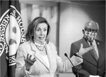  ?? MANUEL BALCE CENETA/AP ?? House Speaker Nancy Pelosi and Majority Whip James Clyburn appear at a news conference Wednesday on Capitol Hill.