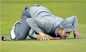  ?? BEN STANSALL/AFP/GETTY IMAGES ?? Stuart Manley Lines up a putt on the 8th green during his opening round on the first day of the Open Golf Championsh­ip on Thursday at Royal Birkdale golf course near Southport, England.