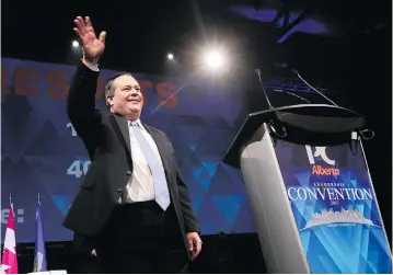  ?? GAVIN YOUNG / POSTMEDIA NETWORK ?? Jason Kenney waves to the crowd after winning the Alberta PC leadership in downtown Calgary on Saturday.