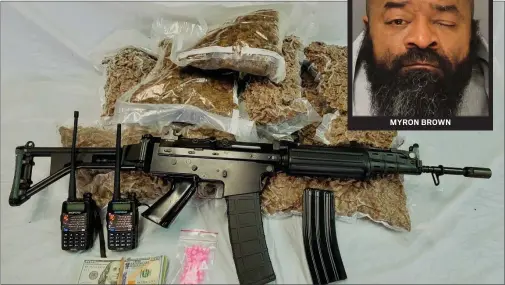  ?? SUBMITTED PHOTO ?? More than 12pounds of “synthetic marijuana” and an assault rifle were seized in the arrest.
MYRON BROWN