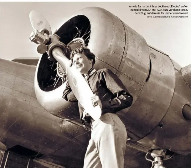  ?? FOTO: ALBERT BRESNIK/THE PARAGON AGENCY/AP ?? Amelia Earhart mit ihrer Lockheed „Electra“auf einem Bild vom 20. Mai 1937, kurz vor dem Start zu dem Flug, auf dem sie für immer verschwand.