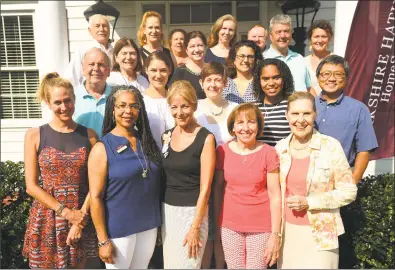  ?? Brian A. Pounds / Hearst Connecticu­t Media ?? The Berkshire Hathaway HomeServic­es team outside their offices at 124 East Ave., Norwalk.