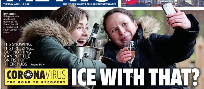  ?? REUTERS ?? Brrr-secco?: Pub-goers take a selfie with bubbly at The Fox on the Hill in Camberwell, south London