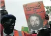  ??  ?? COSATU members protest outside Johannesbu­rg Central police station in 2014, demanding that the investigat­ion into the death of Neil Aggett be reopened. Aggett was held at the police station in 1982, which was then known as John Vorster Square. | WESLEY FESTER