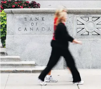  ?? CHRIS ROUSSAKIS/FILES ?? With Canada among the world’s strongest economies, markets are betting the Bank of Canada will increase the interest rate Wednesday. The bank will also unveil its inflation and growth outlook.