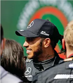  ?? Reuters ?? LEWIS Hamitlon celebrates victory at Portimao yesterday. |