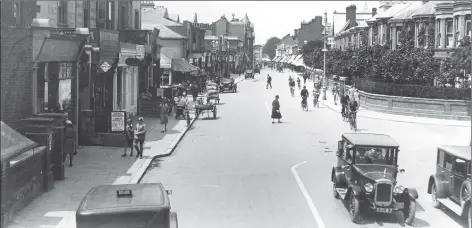  ??  ?? LESS HECTIC
There appear to be more cyclists than motorists on Elm Grove in the 1920's