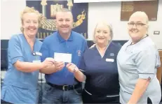  ??  ?? Cheque please Stonehouse Hospital staff with Alan Mcluckie and inset is Alan handing over the cash to Margaret Wragg of LCCT