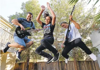  ?? JOSE CARLOS FAJARDO/STAFF ?? From left, Pat Ireland, 49, of Brentwood, is taking his sons Maddox, 13, and John, 17, to the Desert Trip music festival in Indio.