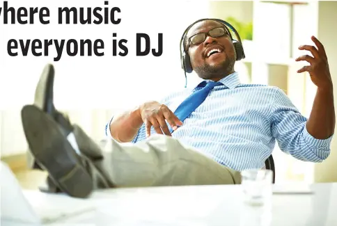  ??  ?? Music in the office can be a polarising factor. — iStock photo