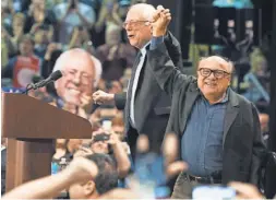  ?? MICHAEL B. THOMAS, AFP/ GETTY IMAGES ?? Actor Danny DeVito introduces candidate Bernie Sanders at a “Future to Believe In” rally at Afton High School on Sunday in St. Louis.