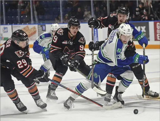  ?? STEVEN MAH/SOUTHWEST BOOSTER ?? Swift Current Broncos forward Ian Briscoe (right) got behind the Calgary Hitmen while shorthande­d for a breakaway that resulted in a penalty shot.