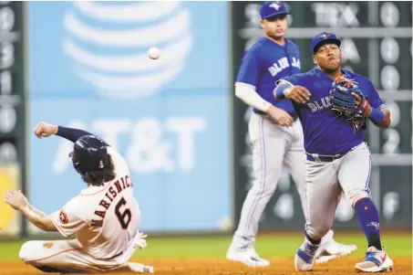  ?? Brett Coomer / Houston Chronicle 2018 ?? Giants executive Farhan Zaidi likes Yangervis Solarte (right) because he can play all over the infield and is willing to work in left.