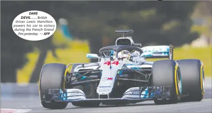  ??  ?? DARE DEVIL ... British driver Lewis Hamilton powers his car to victory during the French Grand Prix yesterday. — AFP