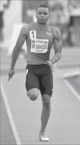  ?? CANADIAN PRESS FILE PHOTO ?? Sprinter Andre De Grasse might be a wealthy young man,but he’s not flashing diamond watches or living ina posh penthouse apartment.