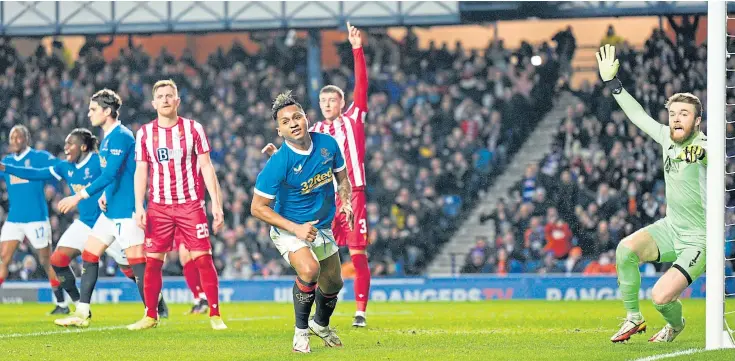  ?? ?? IBROX BLOW: Alfredo Morelos wheels away to celebrate after his header beats Saints keeper Zander Clark to give league leaders Rangers the lead.