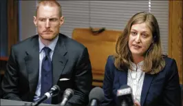  ?? CHARLIE NEIBERGALL / AP ?? Rita Bettis (right), the American Civil Liberties Union of Iowa legal director, speaks at a news conference as Emma Goldman Clinic attorney Sam Jones looks on. A judge says he’ll temporaril­y block the state’s new abortion restrictio­ns.