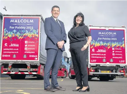  ??  ?? Keep on trucking Malcolm Group chief executive Andrew Malcolm with bid director Jean Cameron