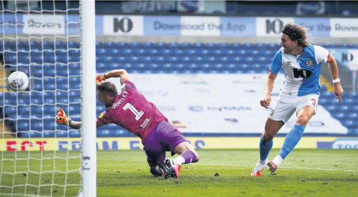 ??  ?? Rovers’ Sam Gallagher scores past goal keeper Daniel Bentley of Bristol City
