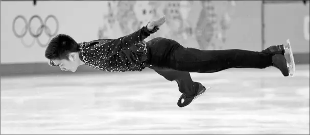  ?? LUCY NICHOLSON / REUTERS ?? Yan Han competes during the figure skating short program at the Sochi Winter Olympics on Friday.