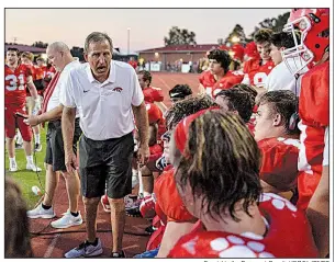  ?? Special to the Democrat-Gazette/JIMMY JONES ?? Cabot Coach Mike Malham (left) gives instructio­ns to his team during the Panthers’ 35-14 victory over Pine Bluff on Aug. 31. Malham, 65, will have his first chance at career victory No. 300 tonight when Cabot takes on Benton. He would become just the second high school football coach in Arkansas with at least 300 career victories.