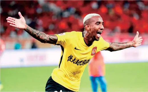  ??  ?? Brazilian football player Anderson Talisca of Guangzhou Evergrande Taobao celebrates after scoring against Shandong Luneng in their 20th-round match during the 2018 Chinese Football Associatio­n Super League in Jinan City. — IC