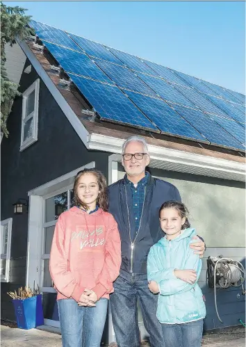  ?? MICHAEL BELL ?? Stephen Hall says he got into solar power for his daughters Amelia, left, and Penelope, right, but soon discovered that there are financial benefits as well.