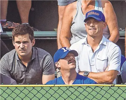  ?? CHICAGO TRIBUNE/TNS VIA GETTY IMAGES ?? Theo Epstein, sporting a fake mustache, says of sitting in the bleachers at Wrigley Field on Sept. 16, “It was wonderful. Even better than I thought it was going to be.”