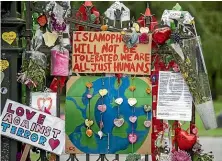  ?? STUFF ?? Tributes are left on Rolleston Ave, Christchur­ch, after the March 15, 2019, terror attack on two mosques. (File photo).