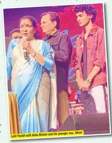  ??  ?? Abeer Bhosle and his younger son, Lalit Pandit with Asha