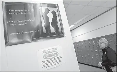  ?? Arkansas Democrat-Gazette/JOHN SYKES JR. ?? Terri Bryant is the school health coordinato­r and improvemen­t director for the Malvern School District, one of seven districts in the state that teach students how to properly use condoms. Students also learn about sexual consent through a role-playing...