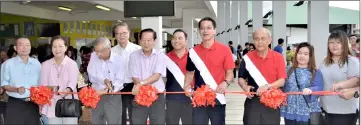  ??  ?? Ting (fourth right), Wong (second left) and others during the cutting of the ribbon ceremony to open the food fair.