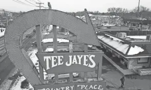  ?? DISPATCH DORAL CHENOWETH, COLUMBUS ?? The Tee Jaye's sign at North High Street and Morse Road has stood for decades, but its fate is in question with a new property owner.