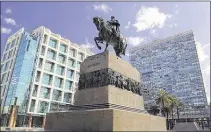  ??  ?? The Plaza Independen­cia in Montevideo features a statue of national hero Gen. Jose Gervasio Artigas.