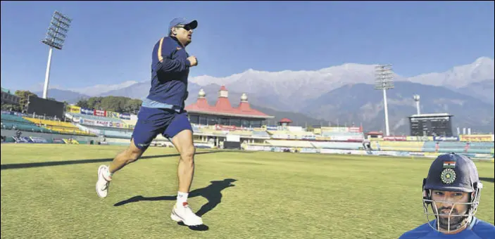  ??  ?? The majestic Dhauladhar range in the background, MS Dhoni warms up ahead of Sunday’s first ODI against Sri Lanka at the HPCA Stadium in Dharamsala.