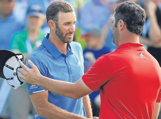  ?? Picture: Getty Images. ?? Dustin Johnson, left, again underlined his No 1 status by defeating Jon Rahm in Sunday’s WGC-Dell Match Play final.