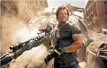  ??  ?? Transforme­rs: The Last Knight finally gives Mark Wahlberg something to do except look angsty and get beaten up.