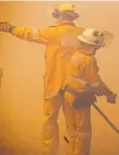 ?? Picture: LACHIE MILLARD ?? Fire crews on the Sunshine Coast.