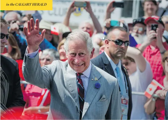  ?? PETER J. THOMPSON / NATIONAL POST ?? Prince Charles tours the Wellington Farmers’ Market in Ontario’s Prince Edward County on Friday, as his royal tour with Camilla, the Duchess of Cornwall, continues.