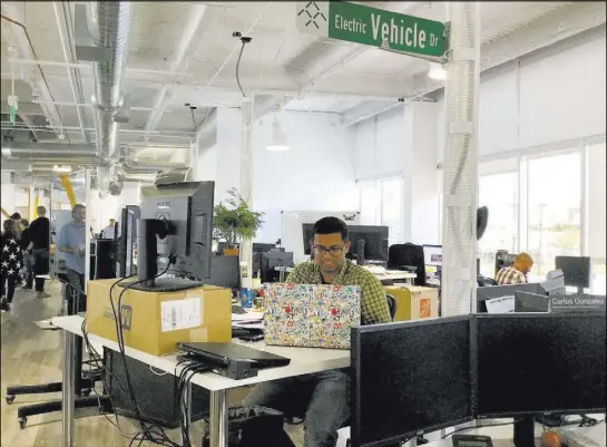  ?? Nicole Raz Las Vegas Review-Journal nraz@reviewjour­nal.com ?? Project engineer Navin Prabhu in Faraday Future’s main research and developmen­t building in Gardena, Calif., which houses more than 1,000 employees. The company broke ground on a North Las Vegas manufactur­ing facility last fall.