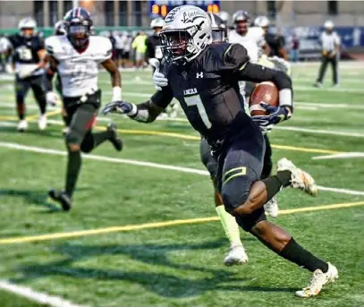  ?? Courtesy of Abraham Lincoln athletics ?? Israel Abanikanda played football, and ran track, at Abraham Lincoln High School in Brooklyn, N.Y. On Friday, he showed off his 4.45 speed, breaking a 70-yard touchdown run against Pitt’s reserve defense.