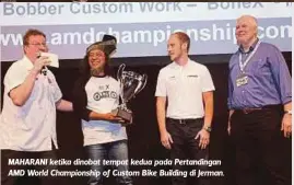  ??  ?? MAHARANI ketika dinobat tempat kedua pada Pertanding­an AMD World Championsh­ip of Custom Bike Building di Jerman.