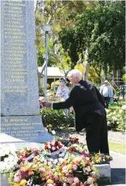  ??  ?? Longwarry RSL president Kevin Stephens unveils the new name addred to the cenotaph that was rededicate­d as part of yesterday’s service.