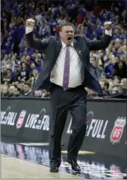  ?? CHARLIE RIEDEL - THE ASSOCIATED PRESS ?? FILE - In this March 10, 2018, file photo, Kansas head coach Bill Self celebrates after winning the NCAA college basketball championsh­ip game against West Virginia in the Big 12men’s tournament, in Kansas City, Mo.