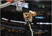  ?? JEFFREY PHELPS — THE ASSOCIATED PRESS ?? Milwaukee Bucks forward Giannis Antetokoun­mpo dunks against the Boston Celtics on Tuesday.